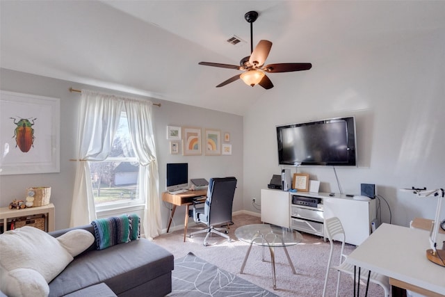 carpeted home office with ceiling fan and lofted ceiling