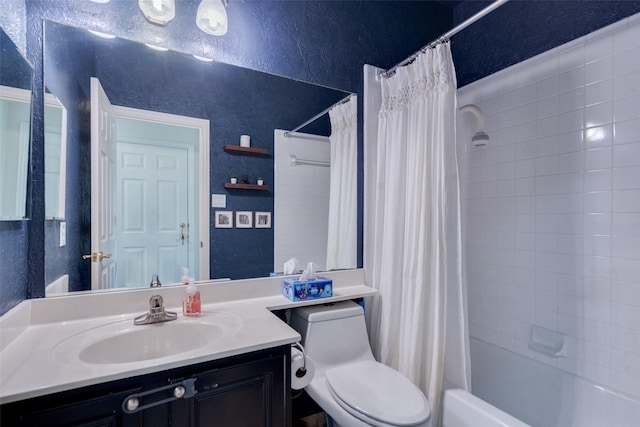 full bathroom with vanity, toilet, and shower / bath combo with shower curtain