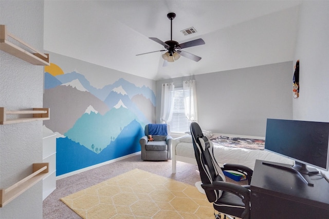 office space with lofted ceiling, ceiling fan, and carpet flooring