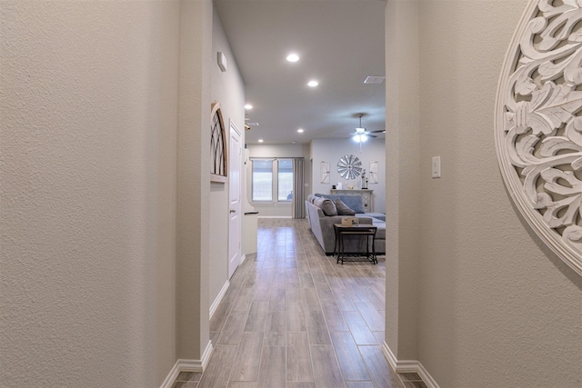 hallway featuring light hardwood / wood-style flooring