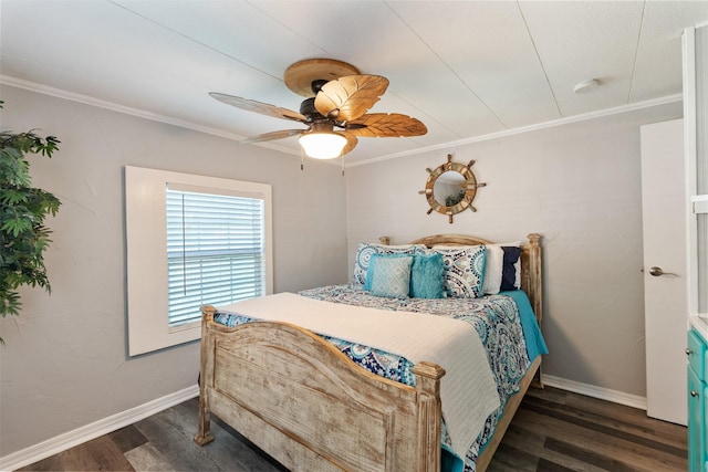 bedroom with crown molding, ceiling fan, and dark hardwood / wood-style floors