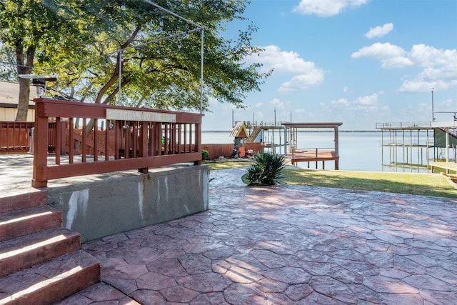 view of patio / terrace with a water view