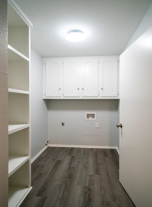 laundry room featuring cabinets, washer hookup, dark hardwood / wood-style flooring, and electric dryer hookup