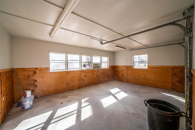 empty room featuring wooden walls