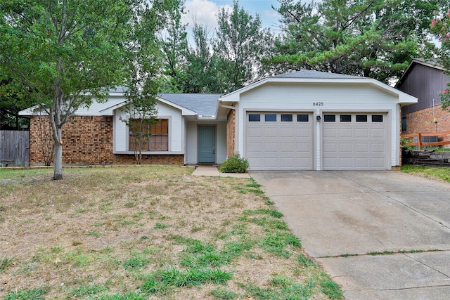 ranch-style home featuring a garage