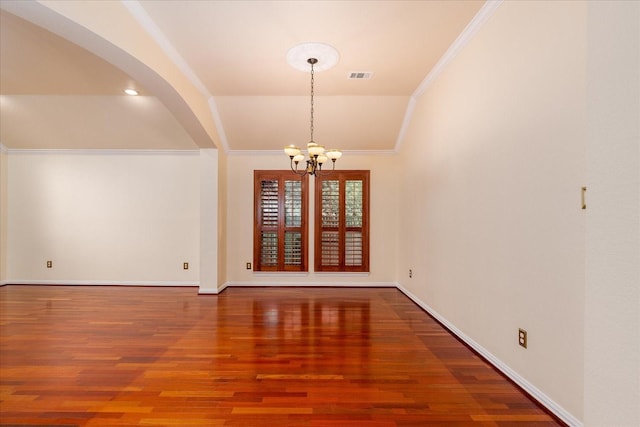 3108 Fernhurst Dr, Richardson, TX 75082 - unfurnished dining area with crown molding, wood finished floors, baseboards, a notable chandelier, and visible vents