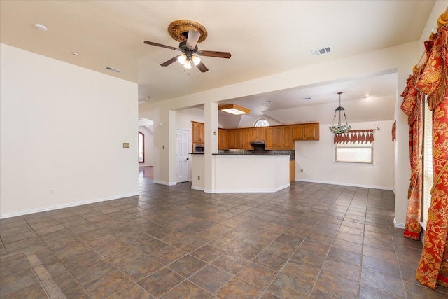 3108 Fernhurst Dr, Richardson, TX 75082 - unfurnished living room featuring ceiling fan, arched walkways, visible vents, and baseboards
