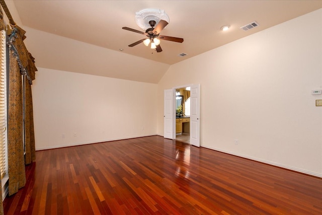 3108 Fernhurst Dr, Richardson, TX 75082 - empty room featuring lofted ceiling, wood finished floors, visible vents, and ceiling fan