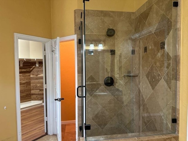 bathroom featuring an enclosed shower