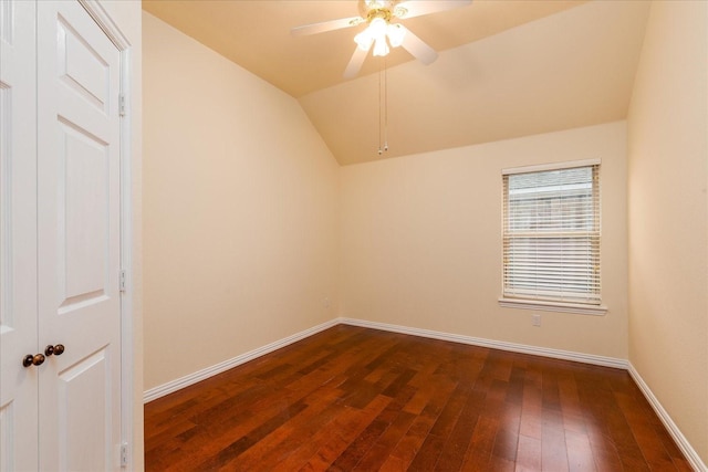 3108 Fernhurst Dr, Richardson, TX 75082 - spare room with dark wood finished floors, lofted ceiling, a ceiling fan, and baseboards