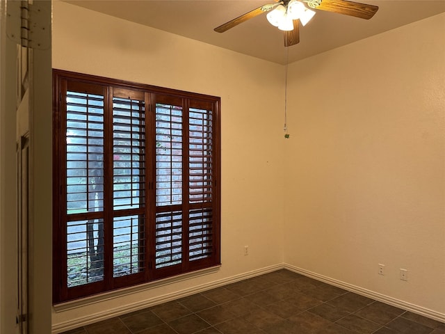 unfurnished room featuring ceiling fan