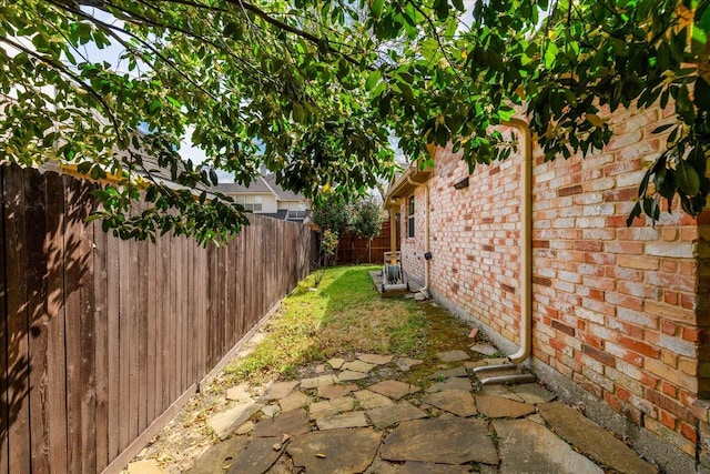 3108 Fernhurst Dr, Richardson, TX 75082 - view of yard featuring a fenced backyard and a patio area