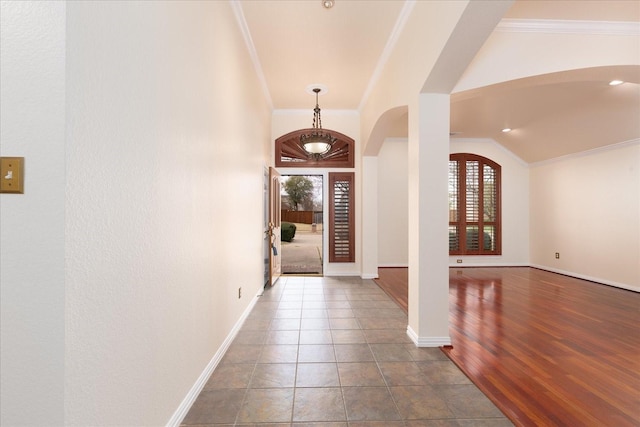 3108 Fernhurst Dr, Richardson, TX 75082 - entryway featuring arched walkways, crown molding, and baseboards
