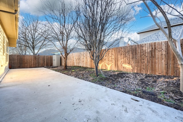 view of patio / terrace with a storage unit