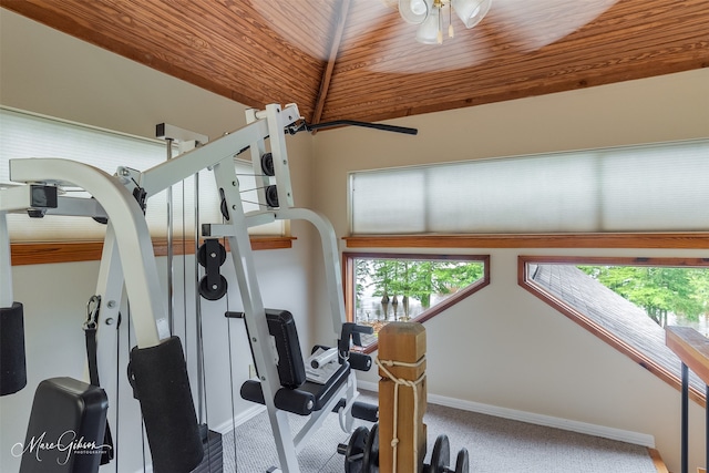 workout room with carpet flooring and wooden ceiling