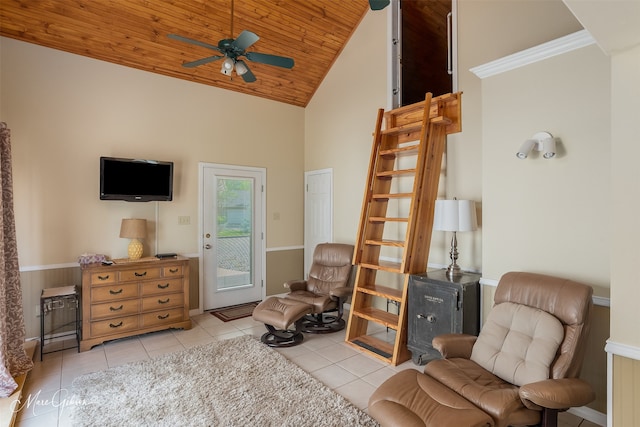 sitting room with light tile patterned flooring, high vaulted ceiling, ceiling fan, and wood ceiling