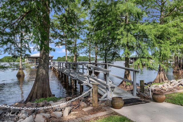 view of dock with a water view