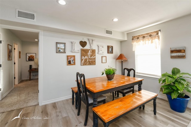 dining area with light wood-type flooring