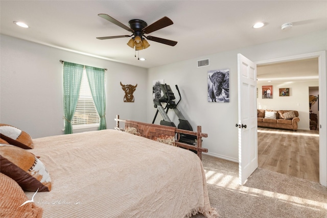 carpeted bedroom with ceiling fan