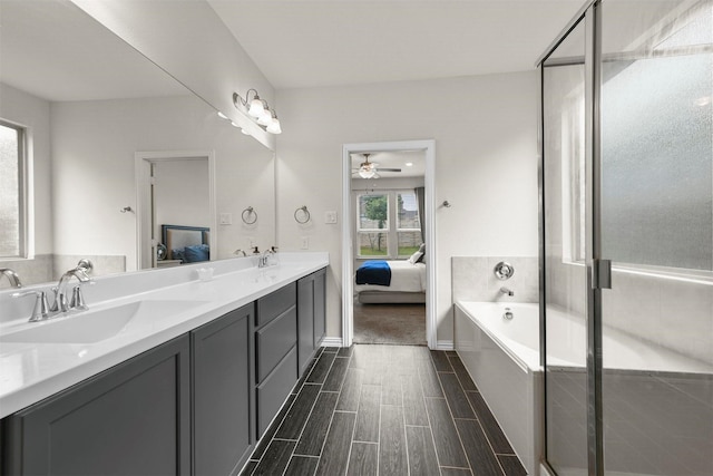 bathroom featuring vanity and plus walk in shower