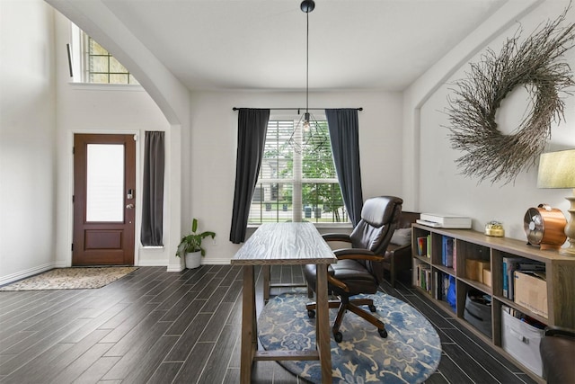 office area with dark wood-type flooring and a healthy amount of sunlight