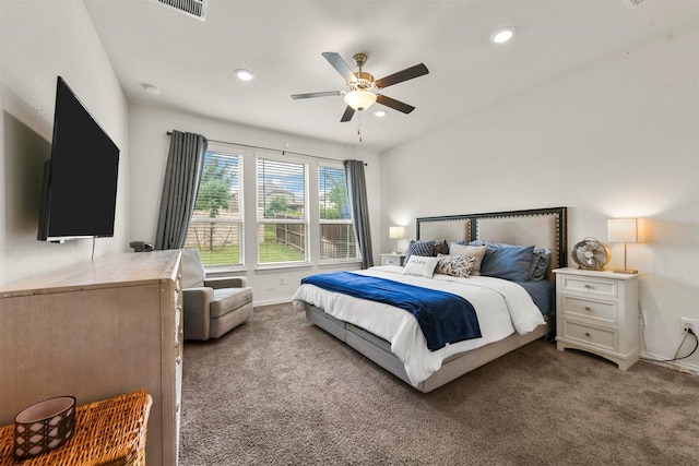 bedroom featuring vaulted ceiling, ceiling fan, and carpet