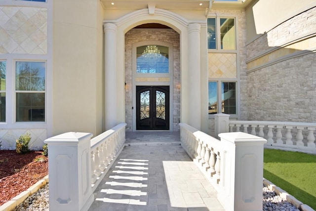 doorway to property featuring french doors