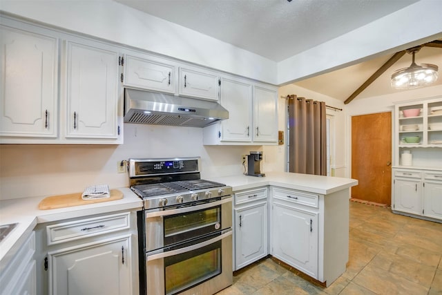 kitchen featuring white cabinetry, double oven range, kitchen peninsula, and vaulted ceiling