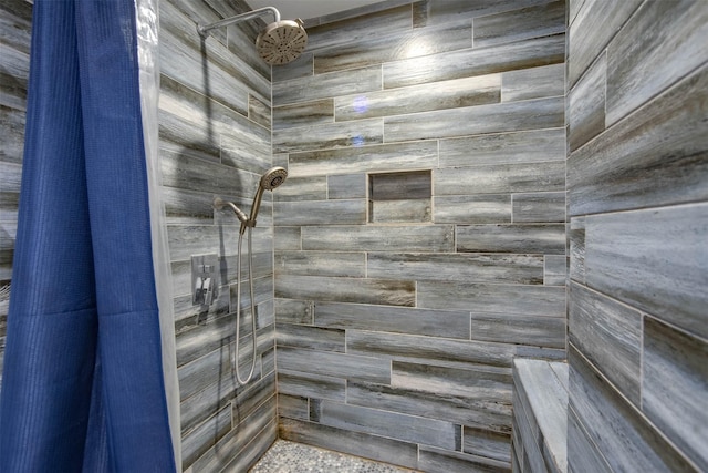 bathroom featuring curtained shower