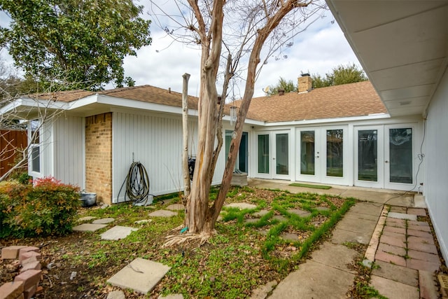 back of property with french doors