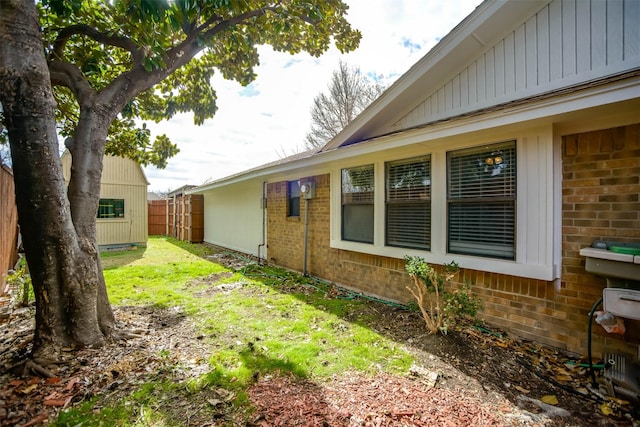 view of home's exterior featuring a yard