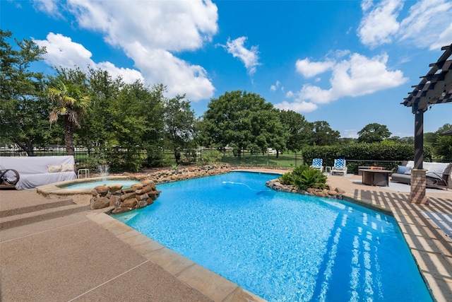 view of pool featuring a patio