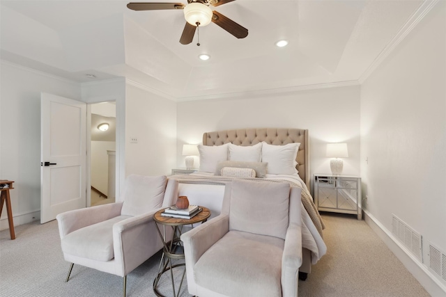 bedroom with crown molding, ceiling fan, a raised ceiling, and light carpet