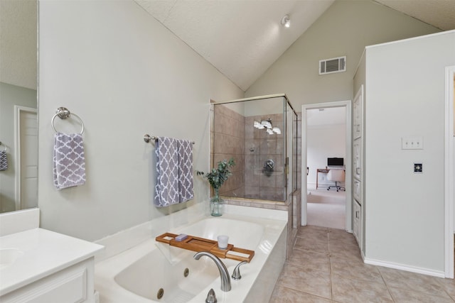 bathroom with vaulted ceiling, tile patterned flooring, vanity, separate shower and tub, and a textured ceiling