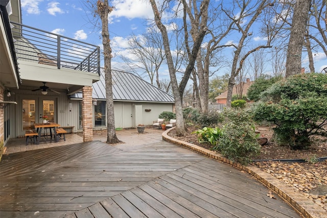 wooden terrace with ceiling fan