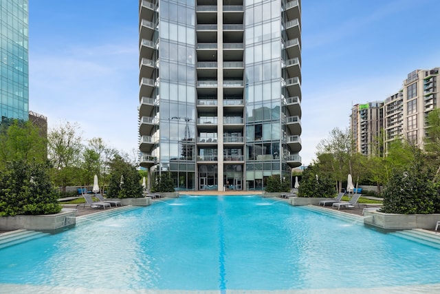 view of pool featuring pool water feature