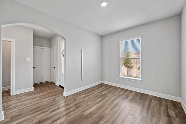 empty room featuring hardwood / wood-style floors