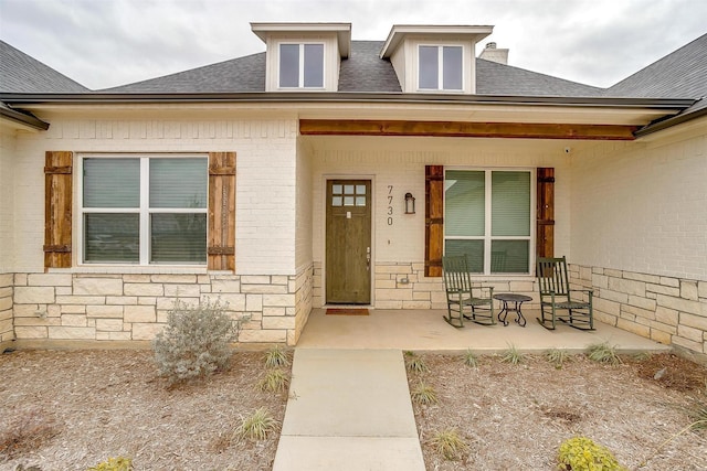 property entrance with a porch