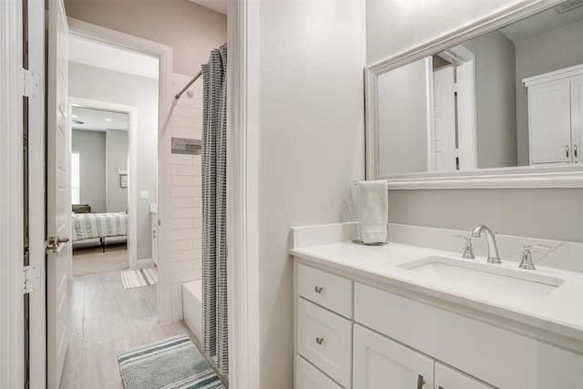 bathroom with vanity and shower / bath combination with curtain