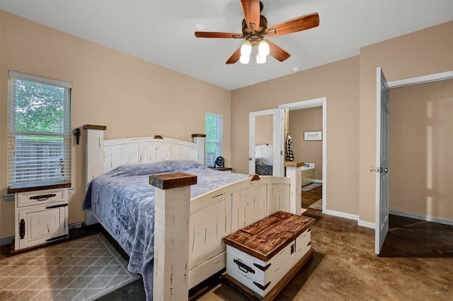 bedroom with multiple windows and ceiling fan