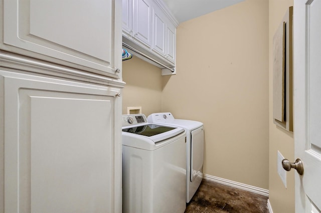 laundry area with cabinets and independent washer and dryer