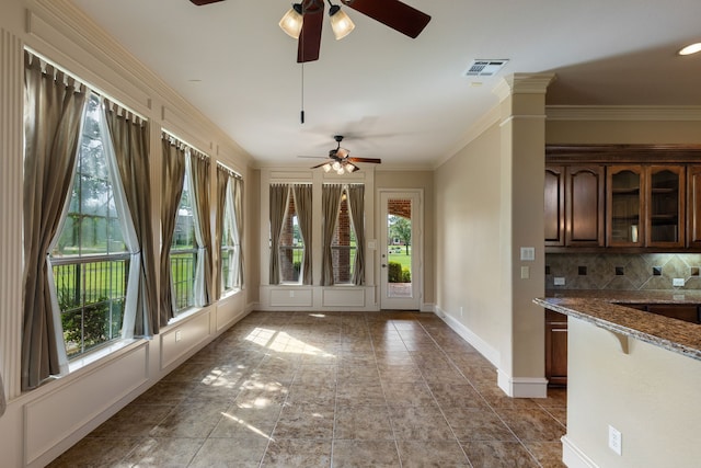 unfurnished sunroom with a healthy amount of sunlight