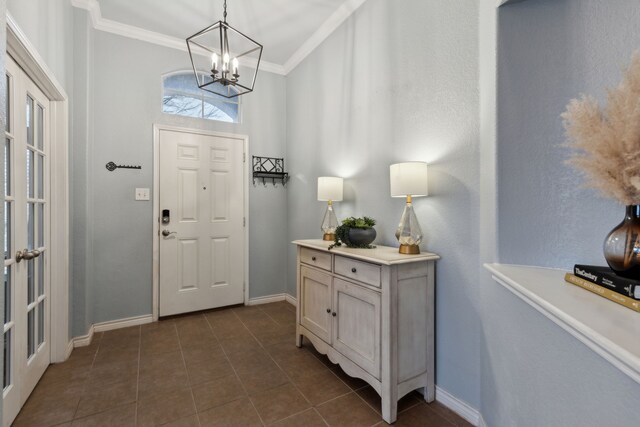 kitchen featuring gray cabinetry, black appliances, white cabinets, a kitchen island, and decorative light fixtures