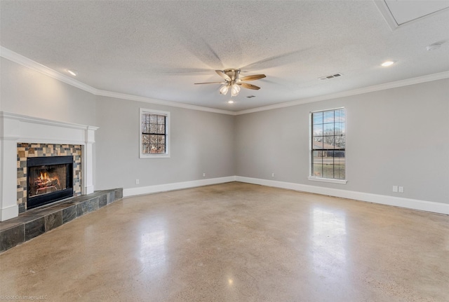 unfurnished living room featuring a fireplace, a textured ceiling, and concrete floors