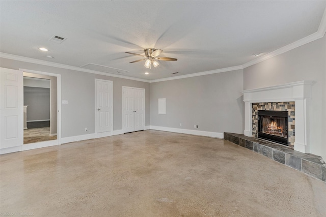 unfurnished living room featuring crown molding, ceiling fan, and a fireplace