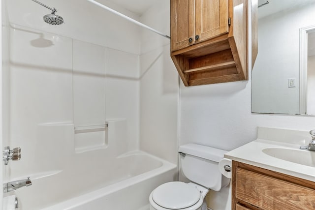 full bathroom featuring vanity, bathing tub / shower combination, and toilet