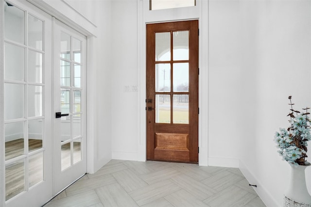 entryway featuring french doors