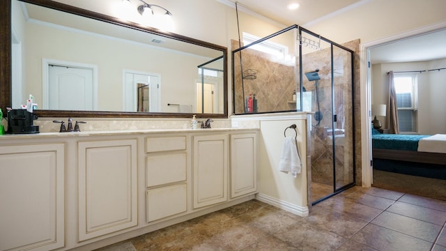 bathroom featuring ornamental molding, a shower with door, and vanity