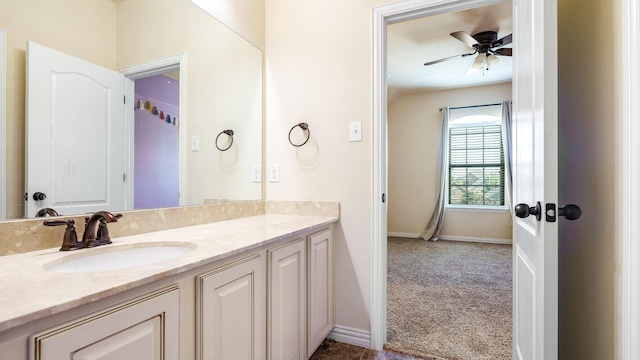 bathroom featuring vanity and ceiling fan