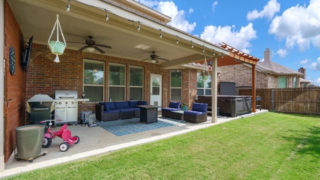 view of patio featuring a hot tub, area for grilling, an outdoor living space, and ceiling fan